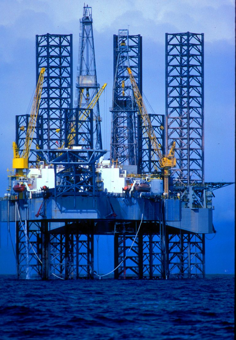 Jack-up drilling rig at sea