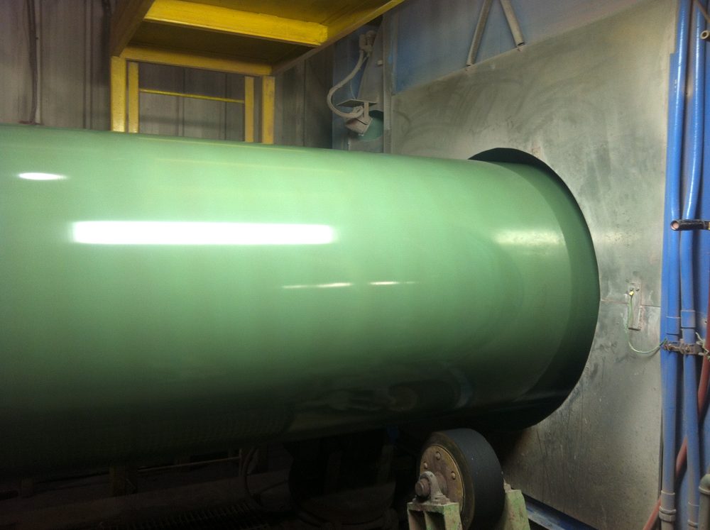 Induction heating of pipe prior to coating